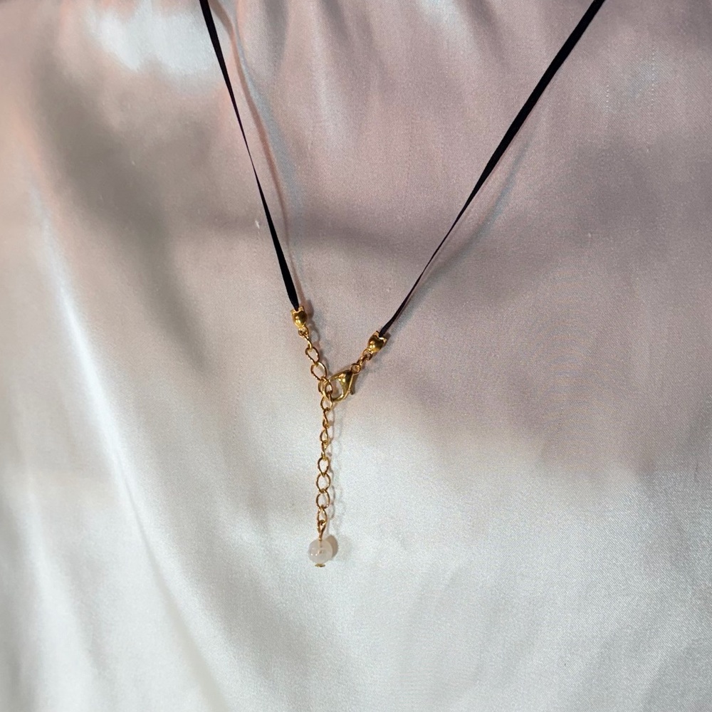 Black with gold rainbow moonstone necklace.